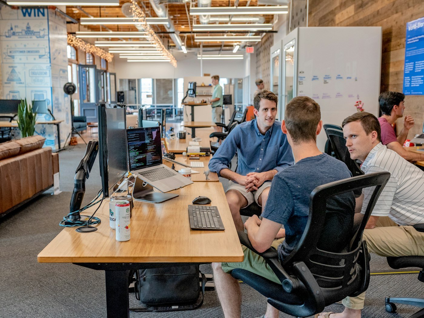 Marketing team reviewing campaign performance on a dashboard