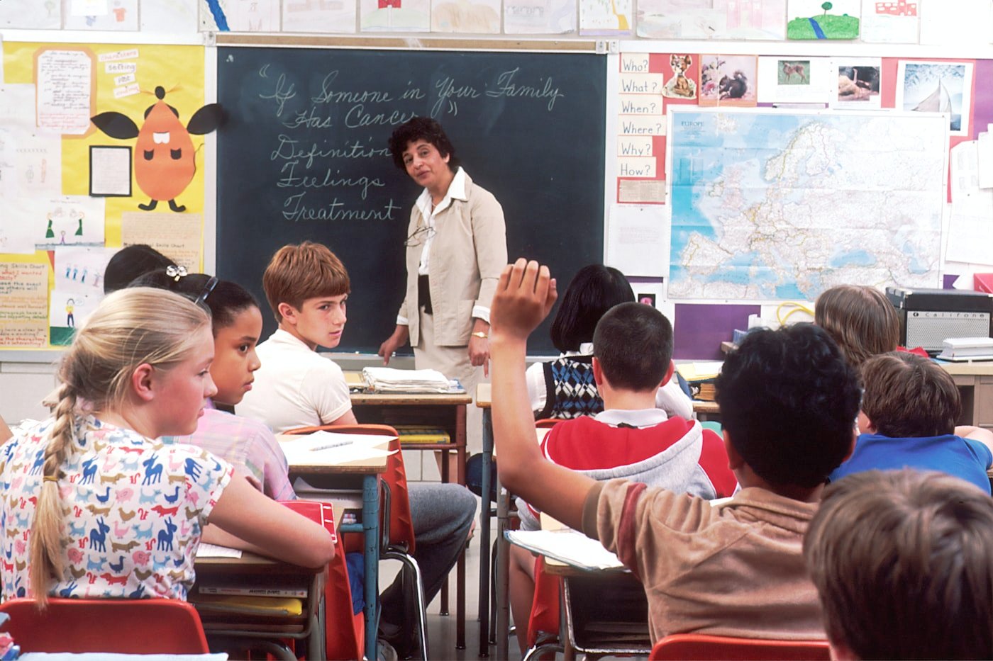 Young students learning together in a classroom
